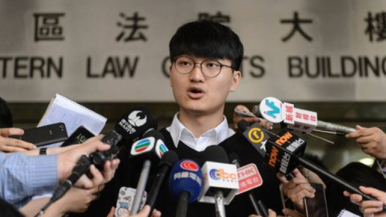 Hong Kong student leader pleads not guilty