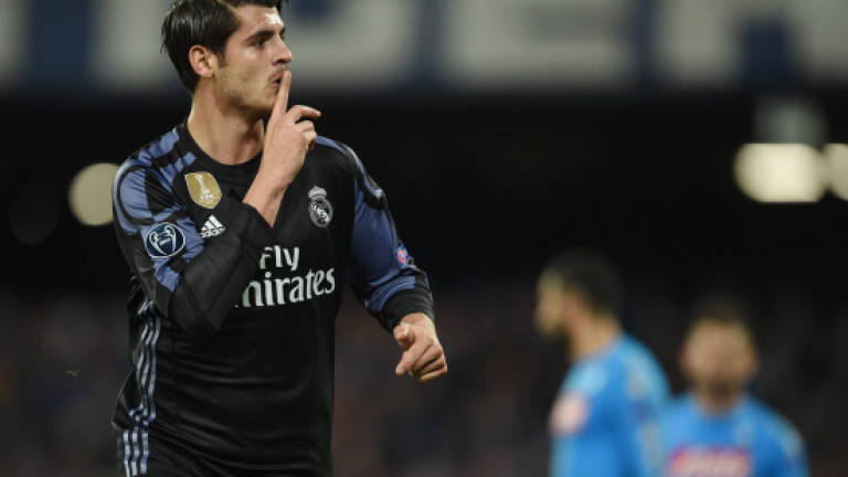 Ramos, Morata strike as Real crush Napoli hopes