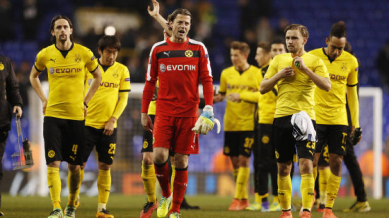 Dortmund eliminate Spurs, Valencia crash out,