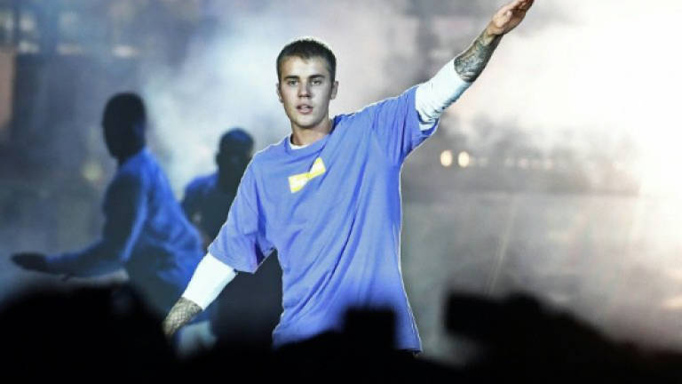 Pop star Justin Bieber hits photographer with car: Police