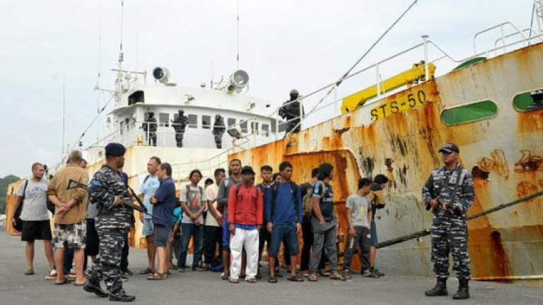 Indonesia seizes alleged 'slave ship' wanted by Interpol