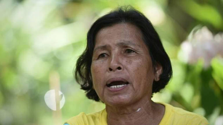Wife of missing Thai land activist jailed for trespassing