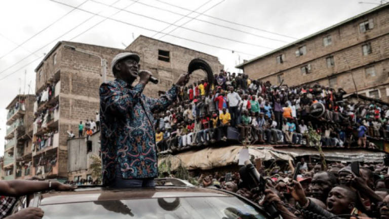 Kenya's Odinga calls strike as he mulls options