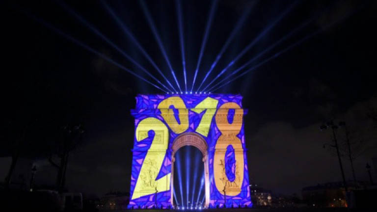 Revellers welcome 2018 in Europe