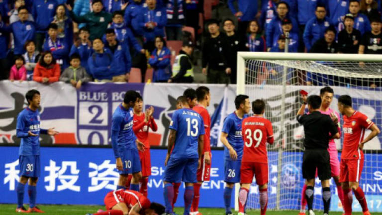 China drafts in foreign refs to halt controversies