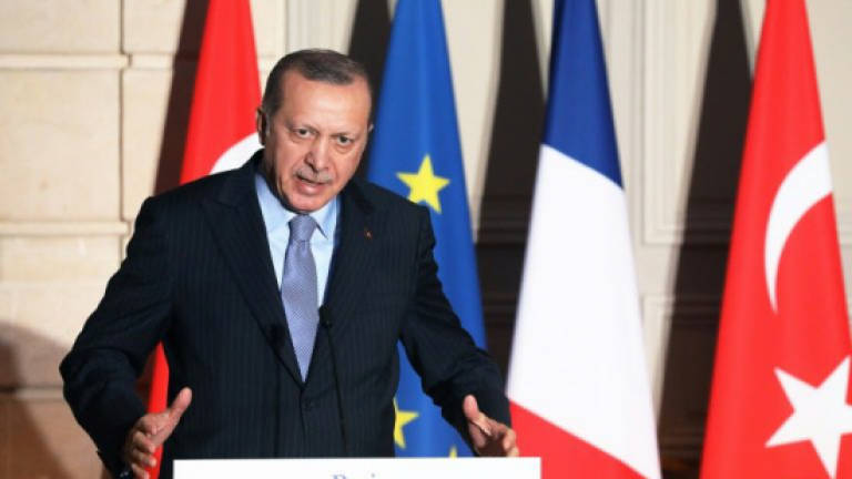'Be careful!' Erdogan warns French reporter over Syria question