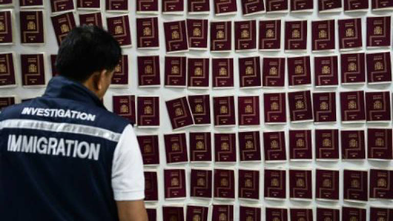 Fall of a forger: 'The Doctor' behind the Thai passport trade