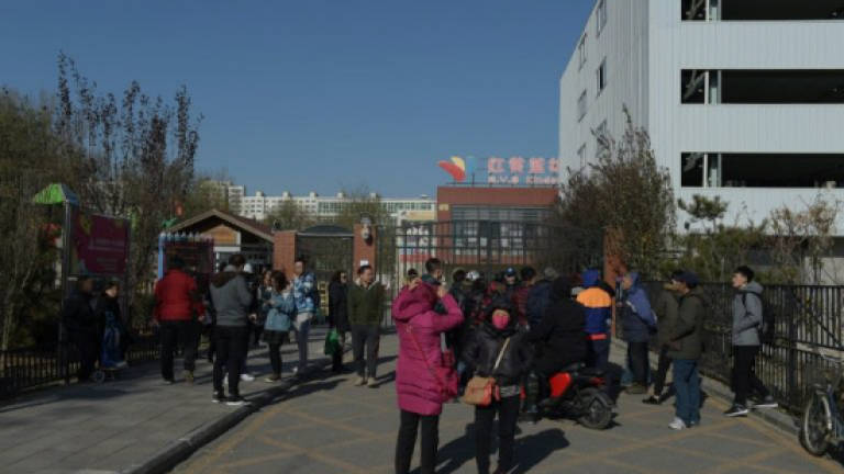 China probes new daycare scandal after 'needle marks' on toddlers