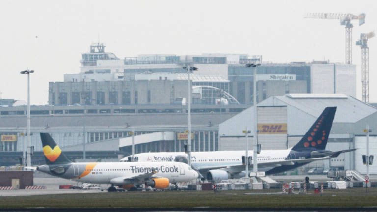 Explosions at Brussels airport, subway stations cripple Belgium