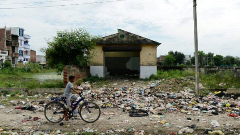 Mountains of garbage and despair in India's dirtiest city