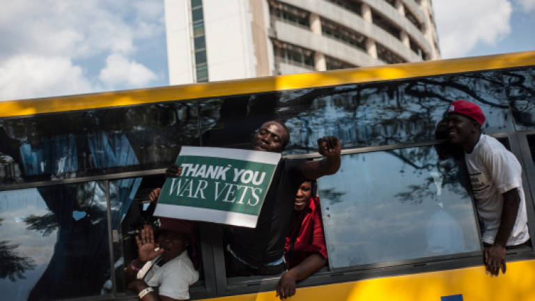 Zimbabweans relish bribe-free roads after Mugabe's fall