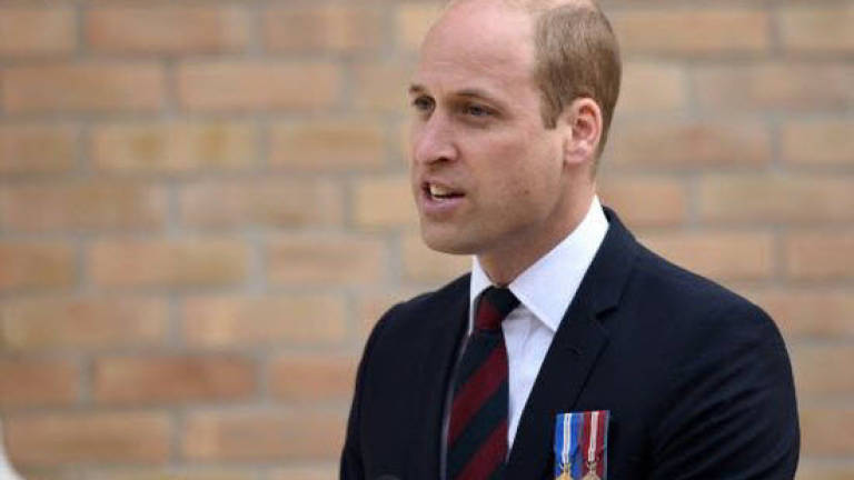 Britain's Prince William heads for historic Middle East tour