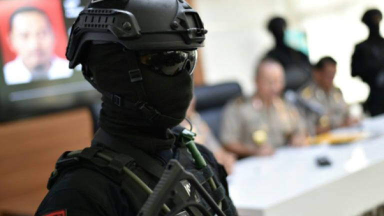 Alleged IS militants kill police officer in Indonesia