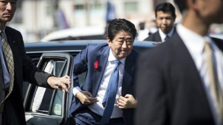 High fives, low bows: Electioneering, Japan style