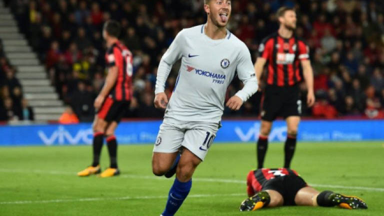Hazard keeps champions Chelsea in title hunt