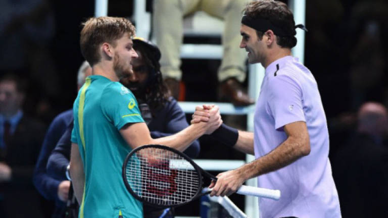 Goffin shocks Federer, faces Dimitrov in ATP Finals decider