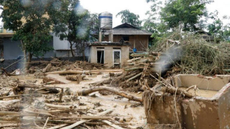Death toll in Vietnam flooding rises to 19