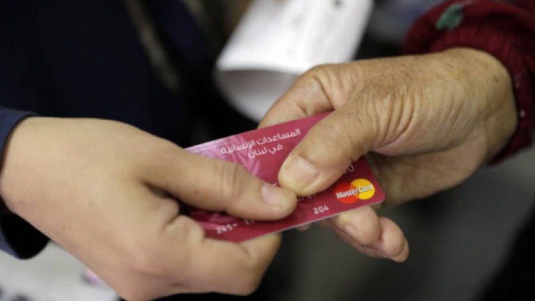 UN refugee cash card scheme boosts Lebanese grocers