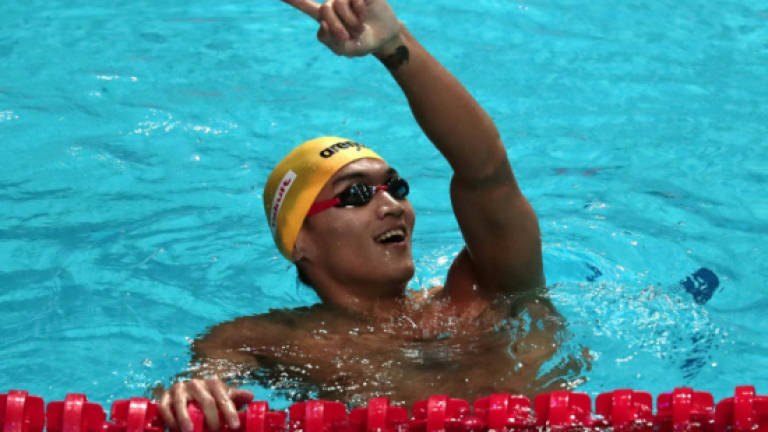 China's Xu claims men's 100m backstroke gold