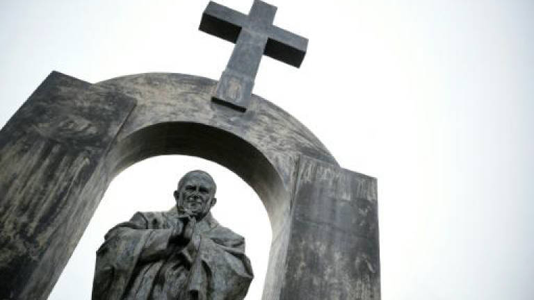 French Catholics lash out at cross removal