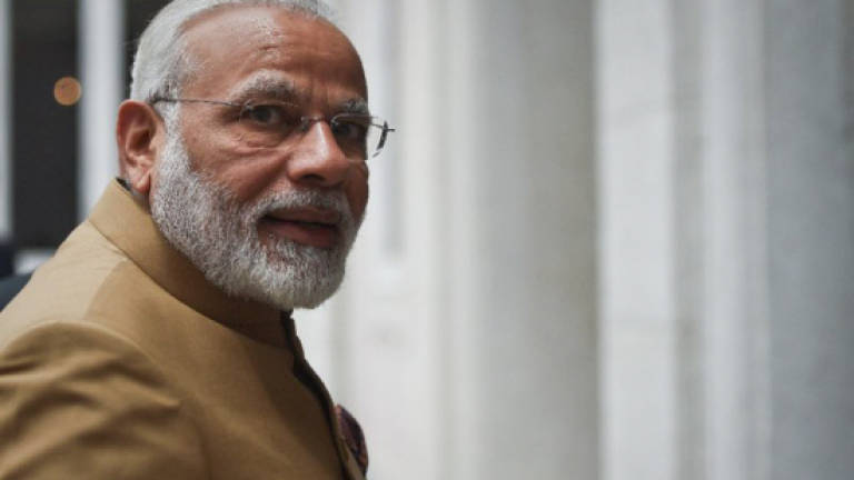 India's Modi heads to Washington for 'no frills' Trump meet