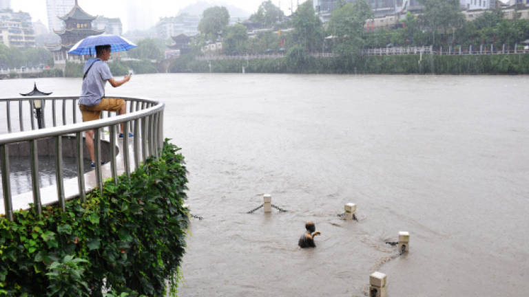 Lightning, floods leave 20 dead in rain-hit China