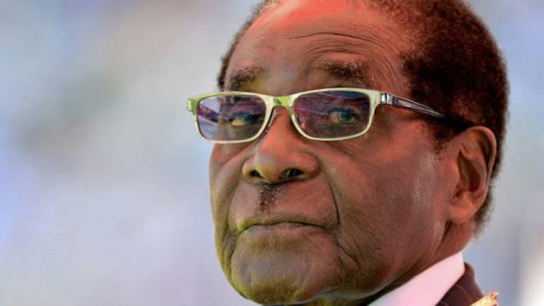 Zimbabwe army warned Mugabe faced being 'lynched': Aide