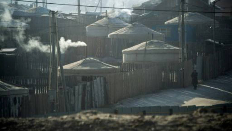 In Mongolia's yurt slums, nomads dream of city life