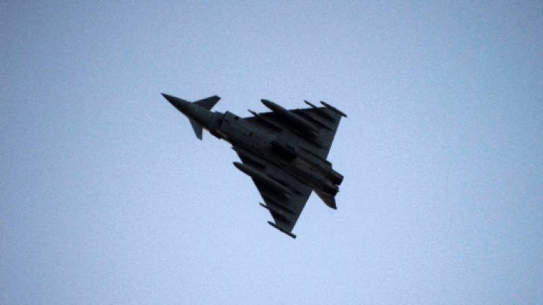 Britain sends jets to intercept Russian bombers