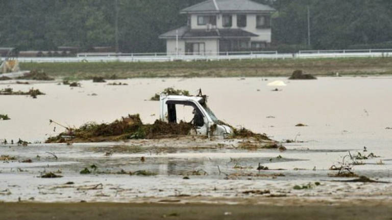 Huge floods sweep southern Japan, two dead, 20 missing (Updated)