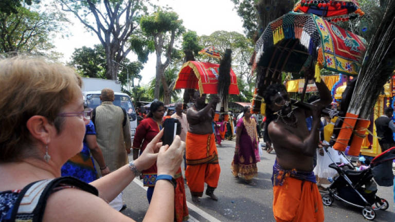 Foreign tourists, other races join in Thaipusam celebration