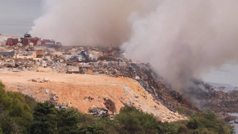 Jelutong landfill catches fire