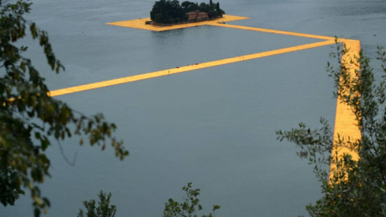 Famed artist Christo invites public to walk on water