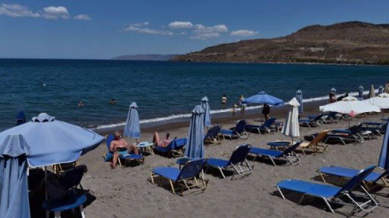 Tourism blow for Greek island that sheltered refugees