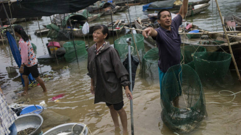 An ancient Chinese fishing community washes ashore