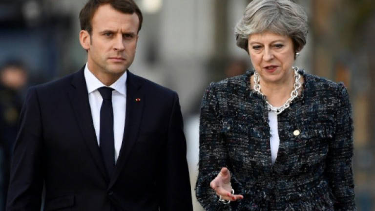 May, Macron to talk terrorism and migration at UK summit