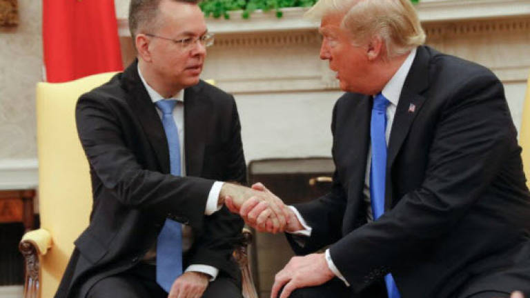 Freed US pastor home from Turkey, meets Trump at White House
