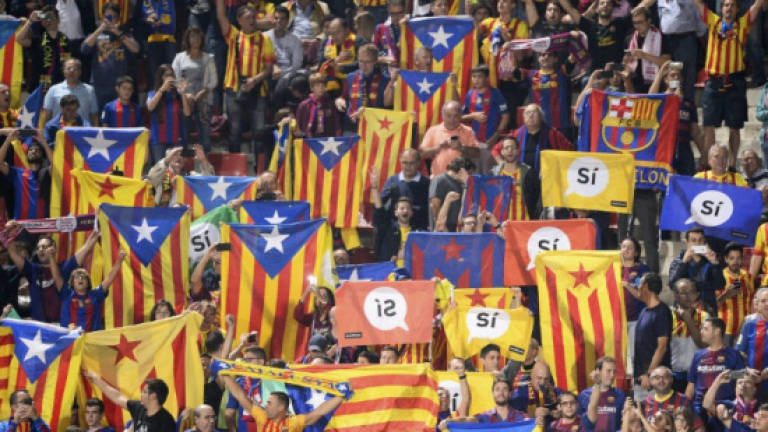 Politically divided Spain united by El Clasico rivalry