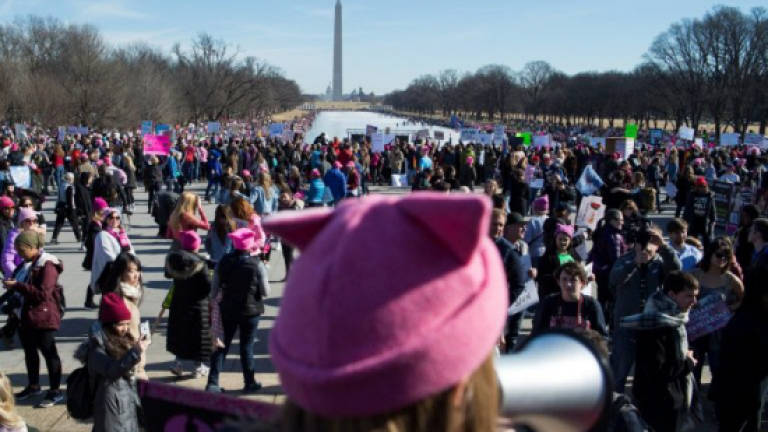 Protestors flock in droves to anti-Trump Women's Marches