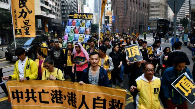 Anti-Beijing protesters march in Hong Kong