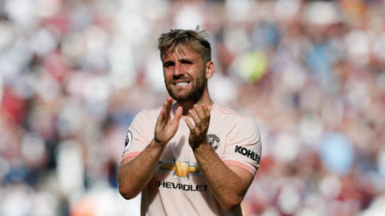 Shaw puts 'odd four years' behind him to sign new five-year Man Utd deal
