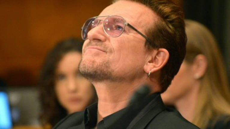 Bono tells US senators aid is security, not charity