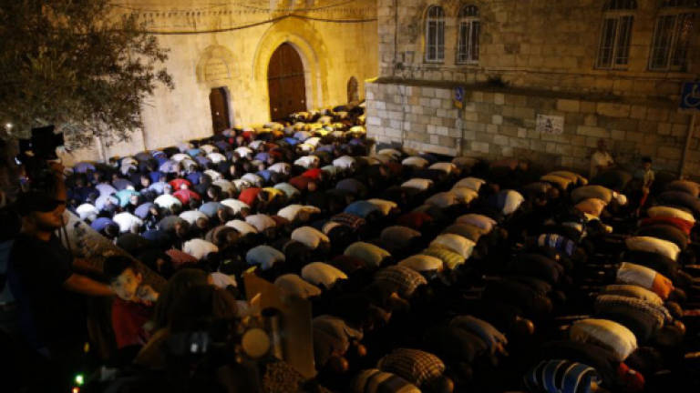 Israel removes holy site metal detectors as Muslims continue boycott