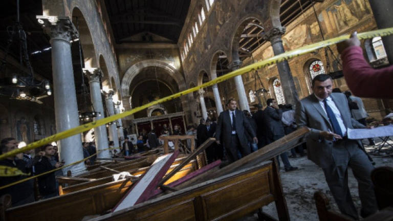 Egypt arrests four over Cairo church bombing