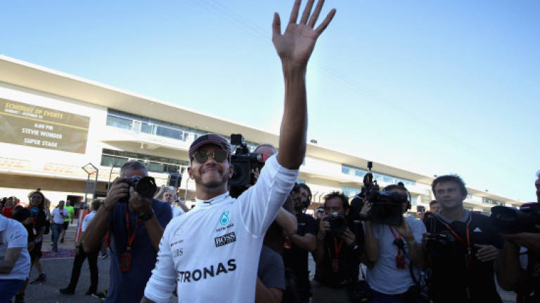 Hamilton cool ahead of Mexico title party date