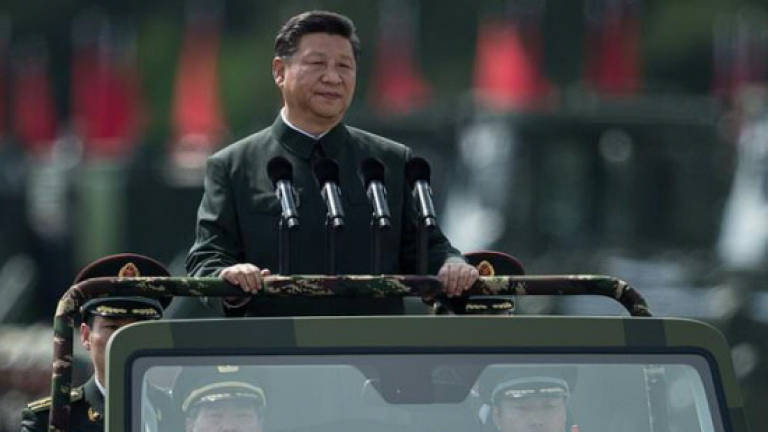 China's Xi urges need for 'world-class' army loyal to Party