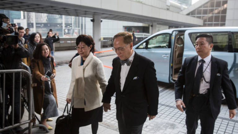 Hong Kong former leader pleads not guilty over corruption (Updated)