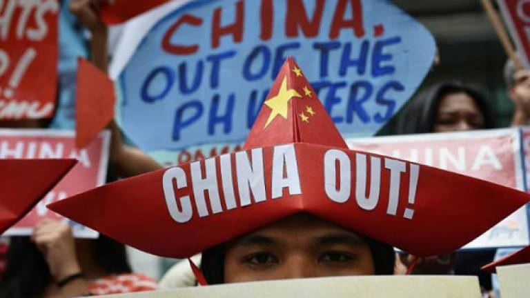 Philippines, China eye joint exploration in disputed waters