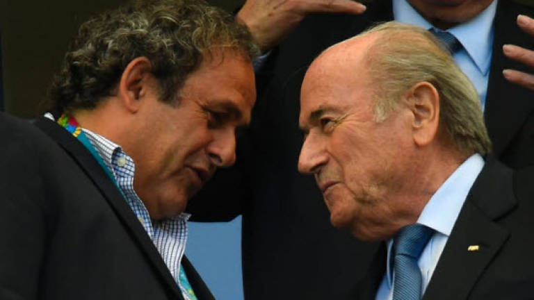 Venerated and vilified, Blatter soldiers on as FIFA boss