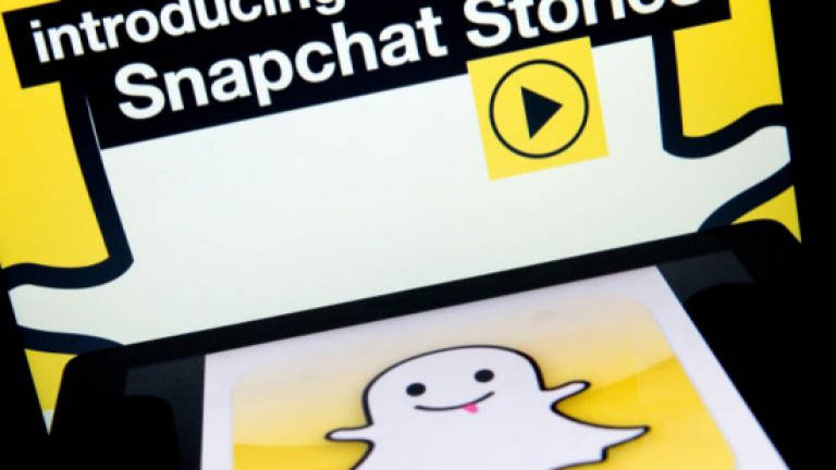 Snap shares dive as loss widens